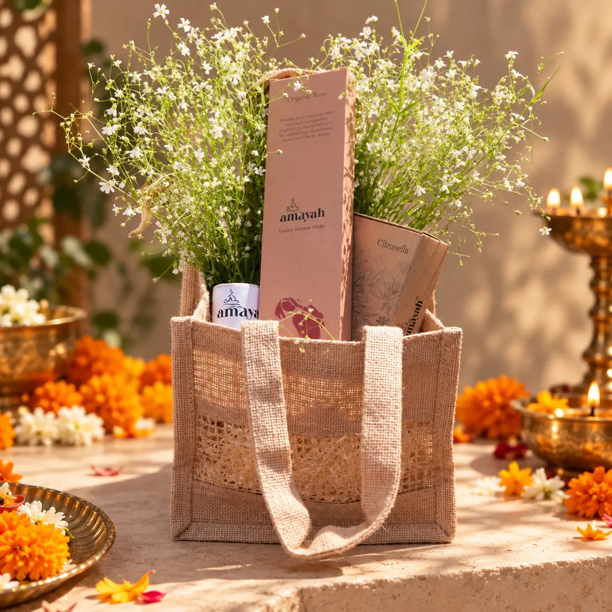 Reusable Amayah jute gift bag styled with festive Diwali decor and warm diya lighting.